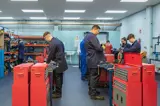 Engineering apprentices carrying out mechanical maintenance training