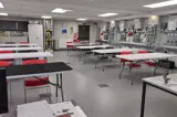 Electrical training suite with desks, projector screen and classroom layout